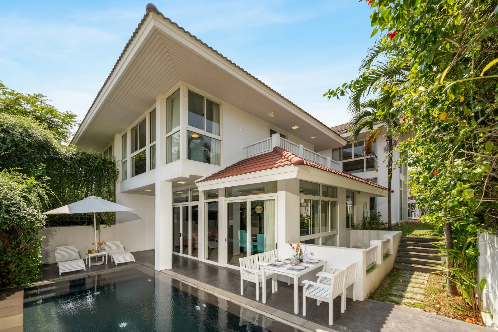 Vacation rental villa with a private pool and outdoor dining area